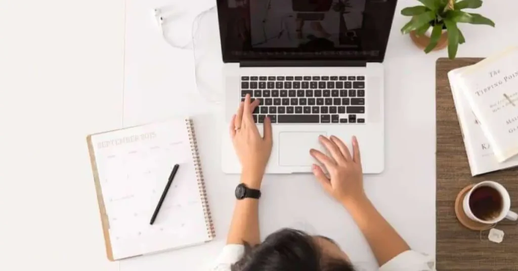 Two traders exchanging cryptocurrency face-to-face in Dubai under compliant, regulated P2P transaction systems.