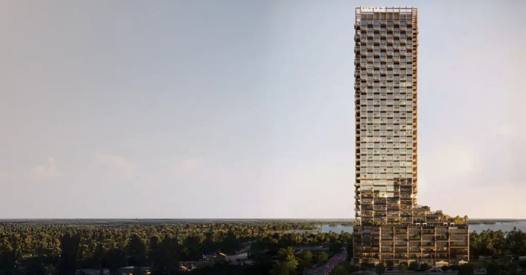 Full-height exterior view of The Symphony tower rising above Meydan Horizon, showcasing its distinctive Zaha Hadid–inspired curved architecture against a serene landscape.