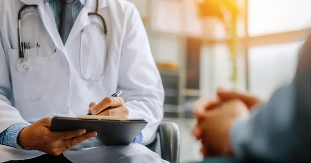 Medical consultant discussing treatment plans during a professional healthcare consultation session