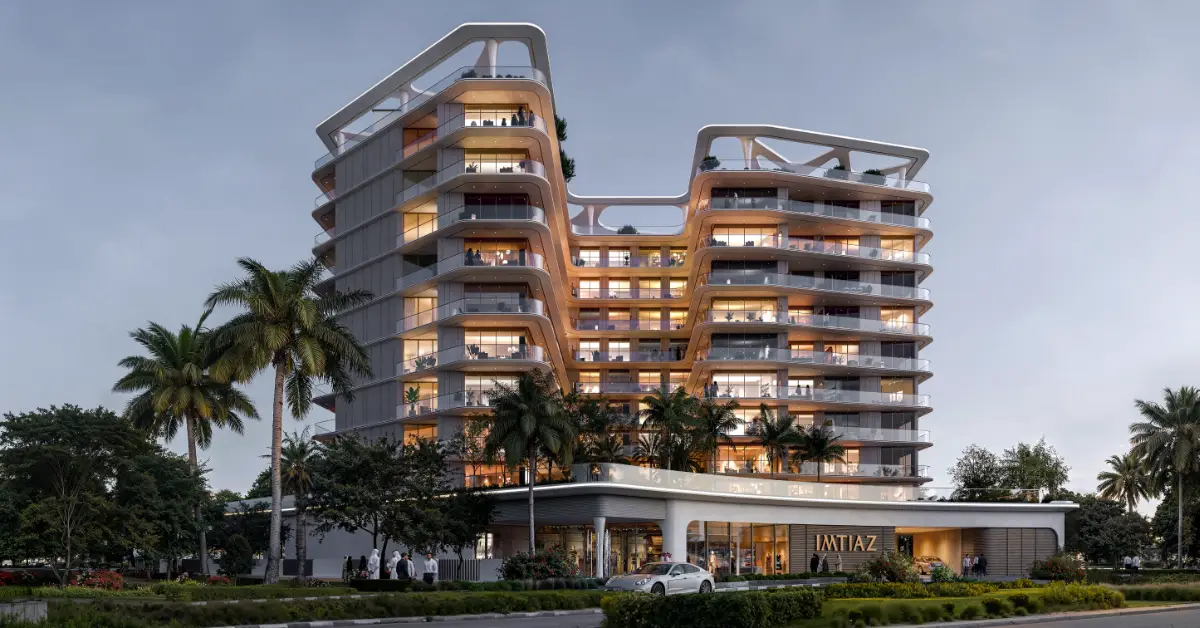 Aerial view of Inara Residence showing landscaped podium, swimming pool, cabanas, palm trees, and outdoor leisure areas