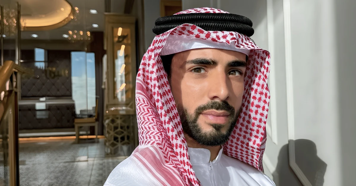 Miguel Santos wearing traditional Emirati attire in Dubai, embracing local culture after relocating from Portugal