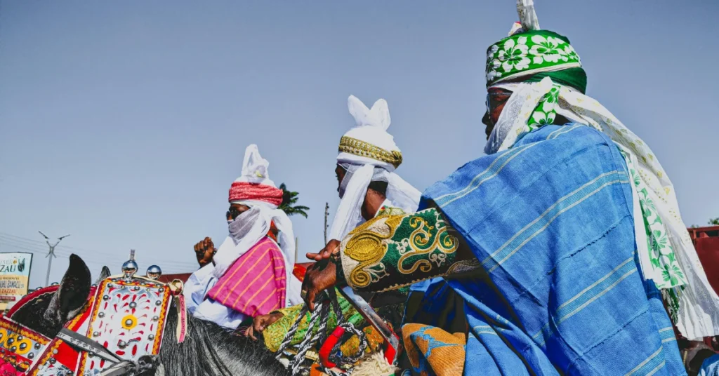 Traditional Nigerian cultural procession representing ambitious Nigerian entrepreneurs expanding globally